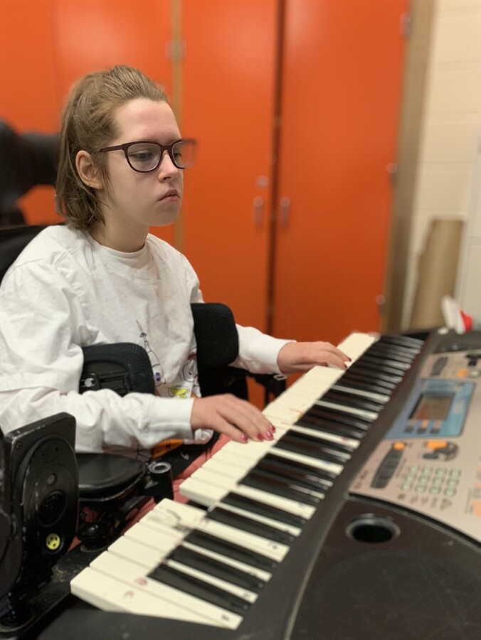 Picture of a student playing piano