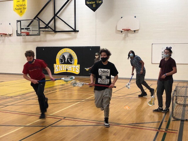 Students playing lacrosse