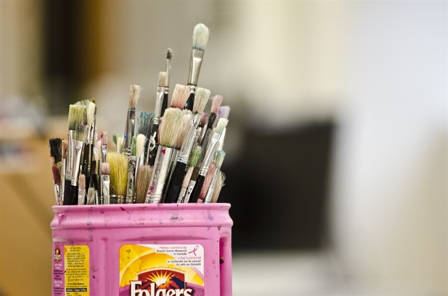 picture of paint brushes with a blurred background