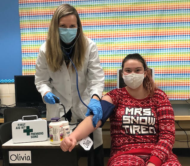 picture of a student getting their blood pressure taken